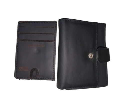 Two black leather wallets on a textured surface