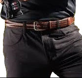 Person wearing a black t-shirt and dark pants with a brown belt on a grassy field.